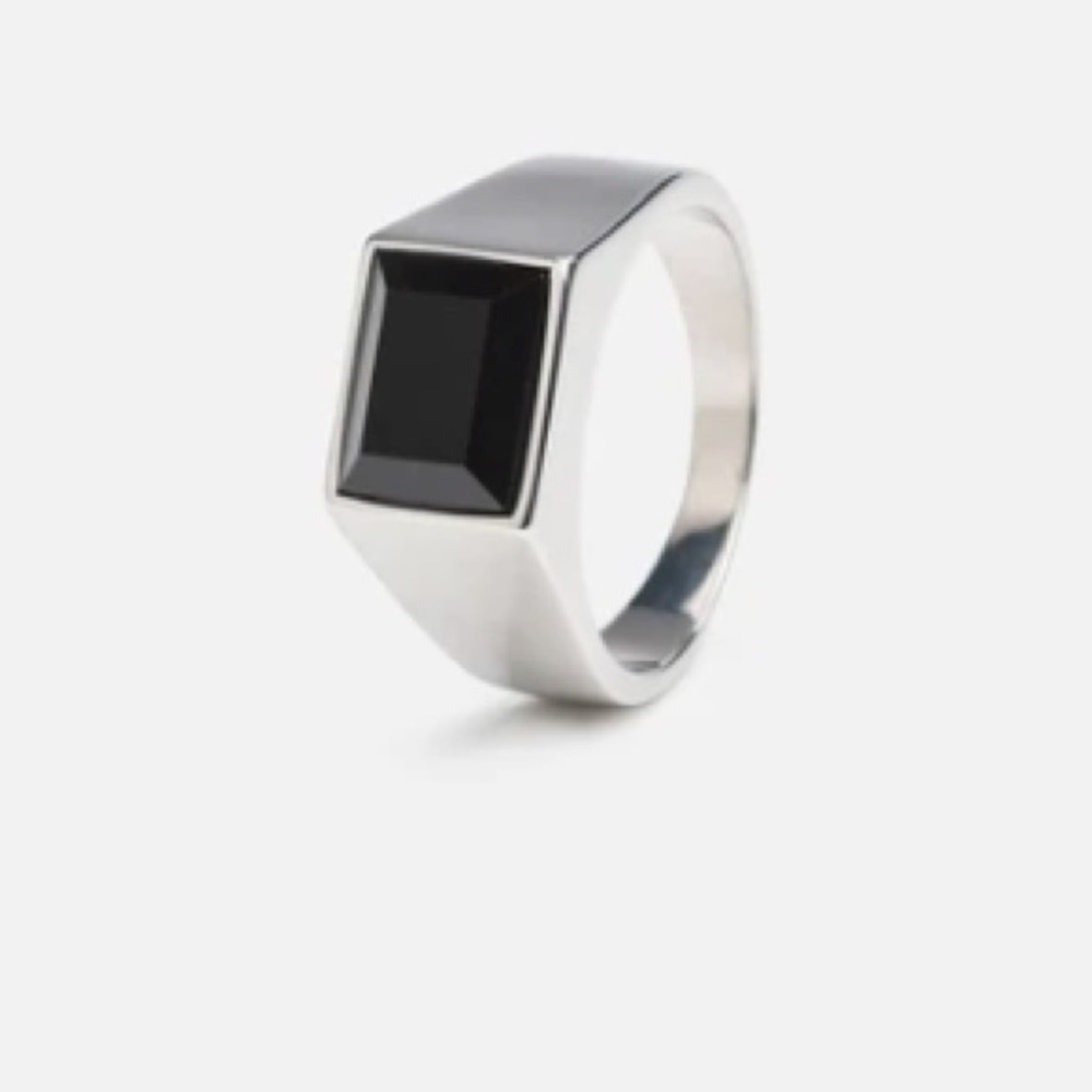 Silver ring with black gem